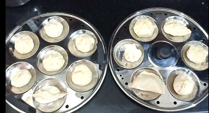 paneer momos recipe - cooking preparation using idli plates